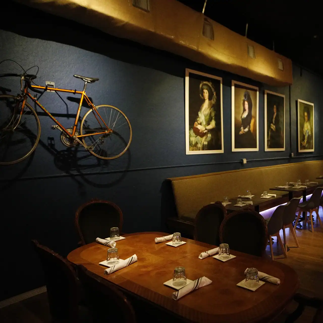 Wall-mounted vintage bicycle in a restaurant.